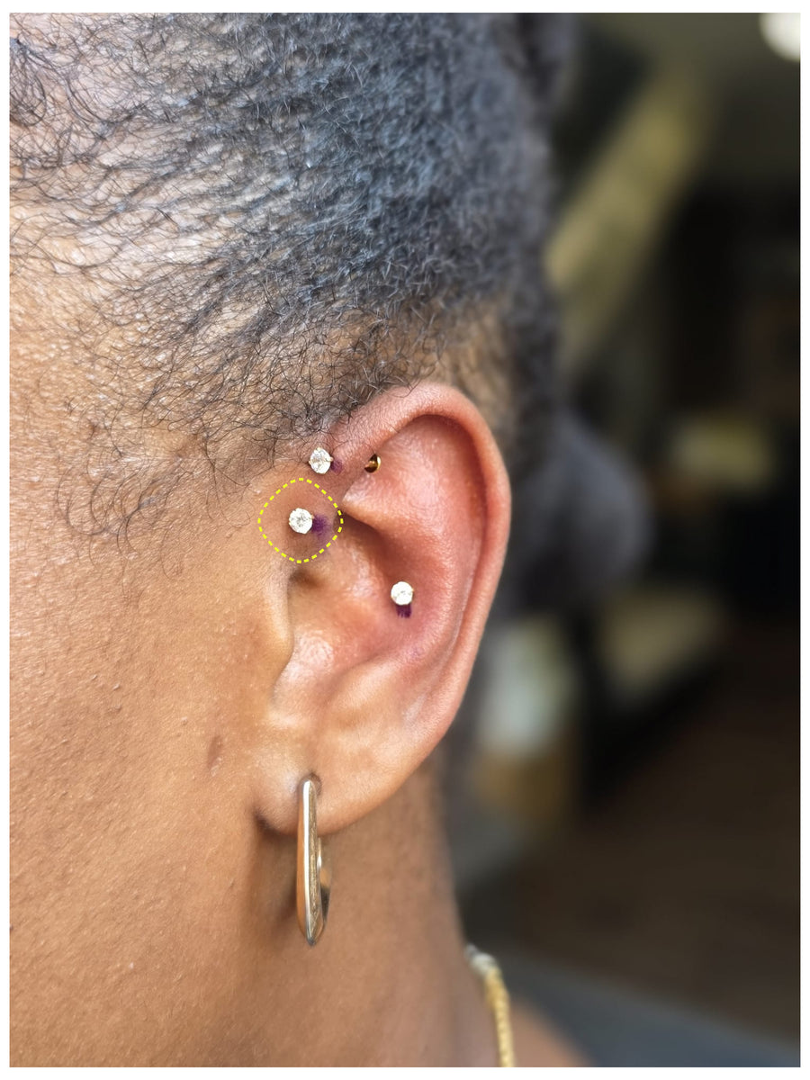 Clear Crystal flatback earring worn on the ear