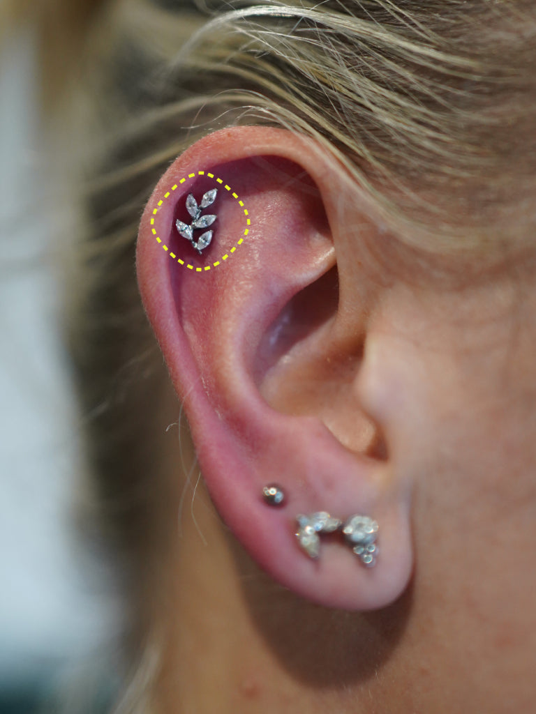 Leaf Vine flatback earring worn on the ear