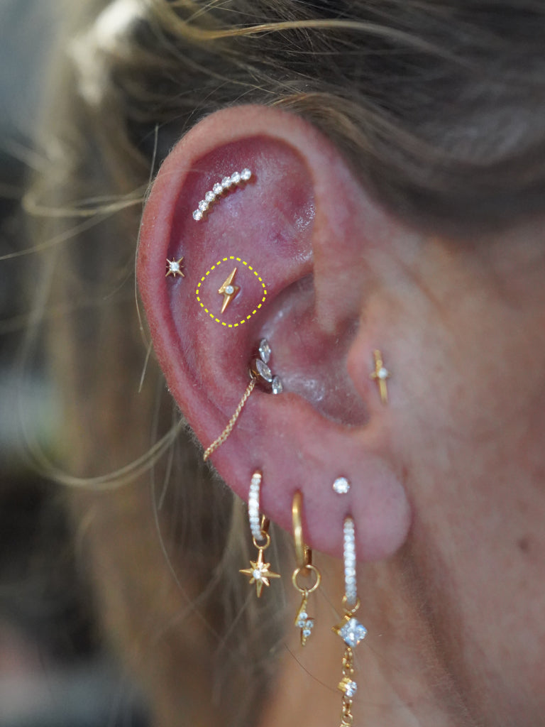 Lightning Bolt flatback earring worn on the ear