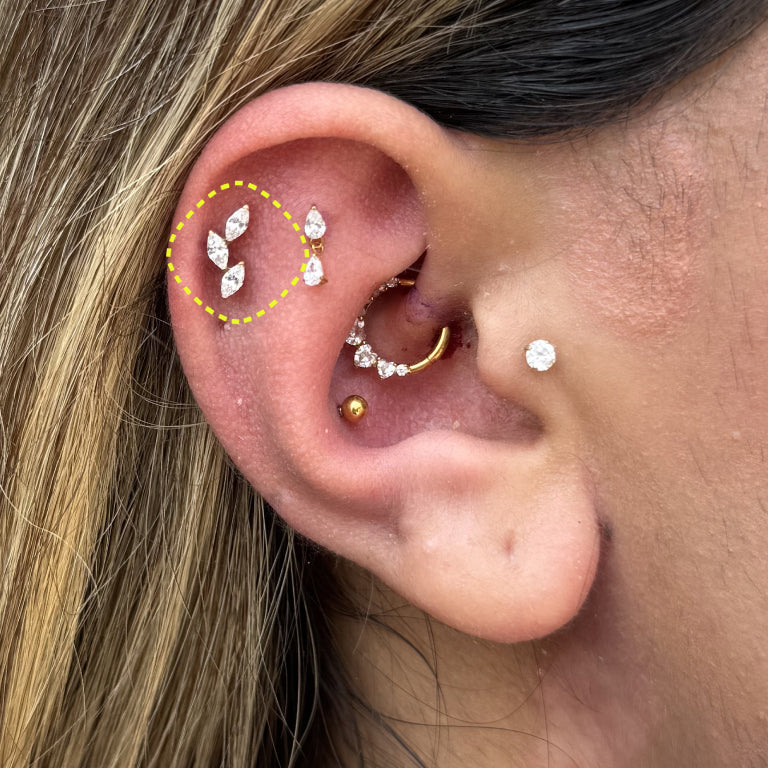 Marquise Vine flatback earring worn on the ear